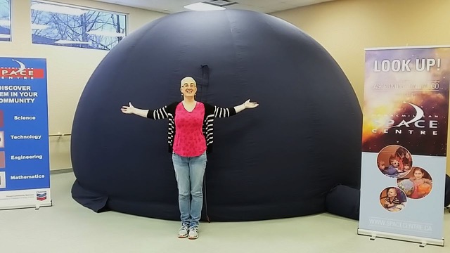 Sonya Neilson with the Starlab. Used with permission of the H.R. MacMillan Space Centre.