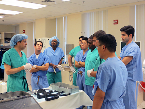 Dr.Lew Schon (left), speaking with orthopedic surgeons in Union Memorial's Foot and Ankle fellowship program. Credit: Medstar Union Memorial Hospital—used with permission